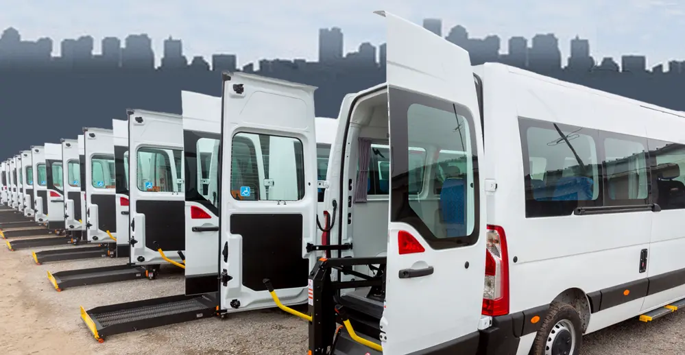 A professional driver preparing a wheelchair-accessible vehicle for a ride in Metro Atlanta.
