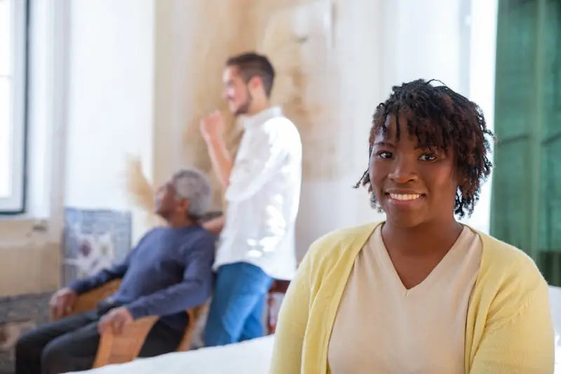 A doctor performing an outpatient procedure on a patient in a clinic.